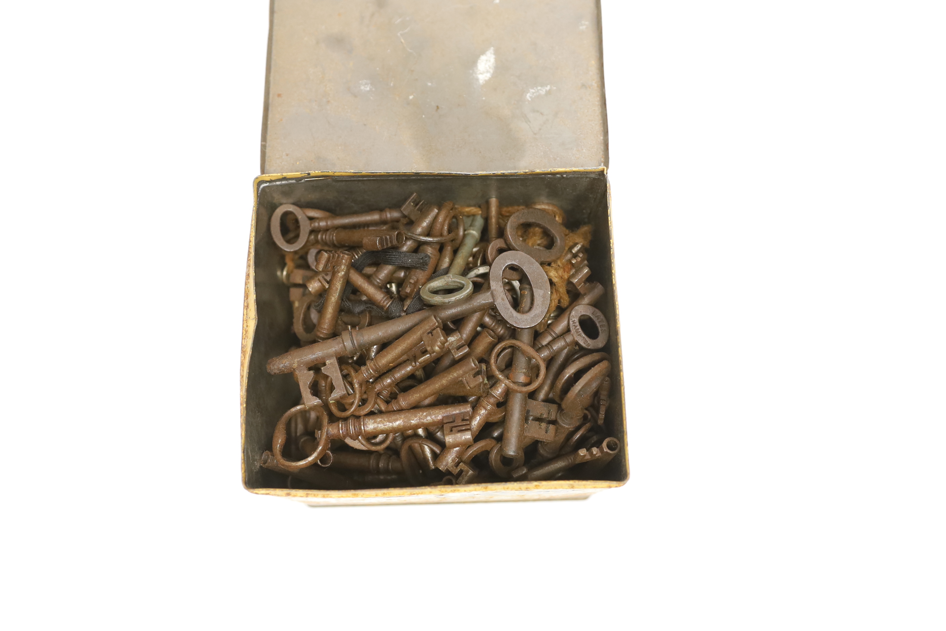 A large collection of antique and later keys including hollow barrel skeleton examples, largest 11cm in length